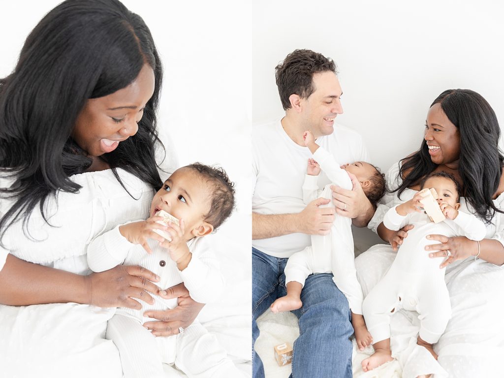 Young family cuddling and smiling with 1 year old twin boys during twin family session 